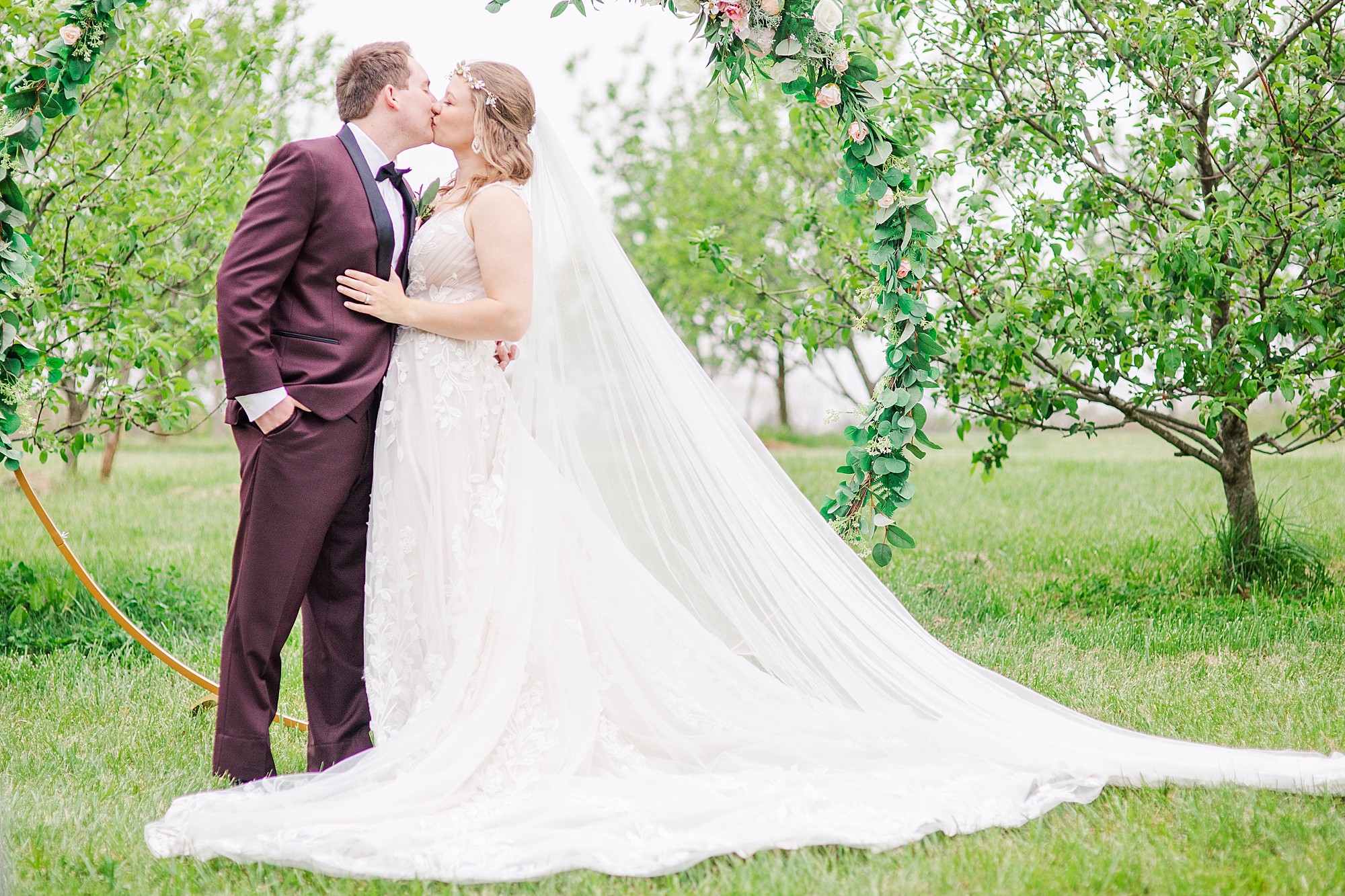 newlyweds kiss after elopement on Pierce Century Farm