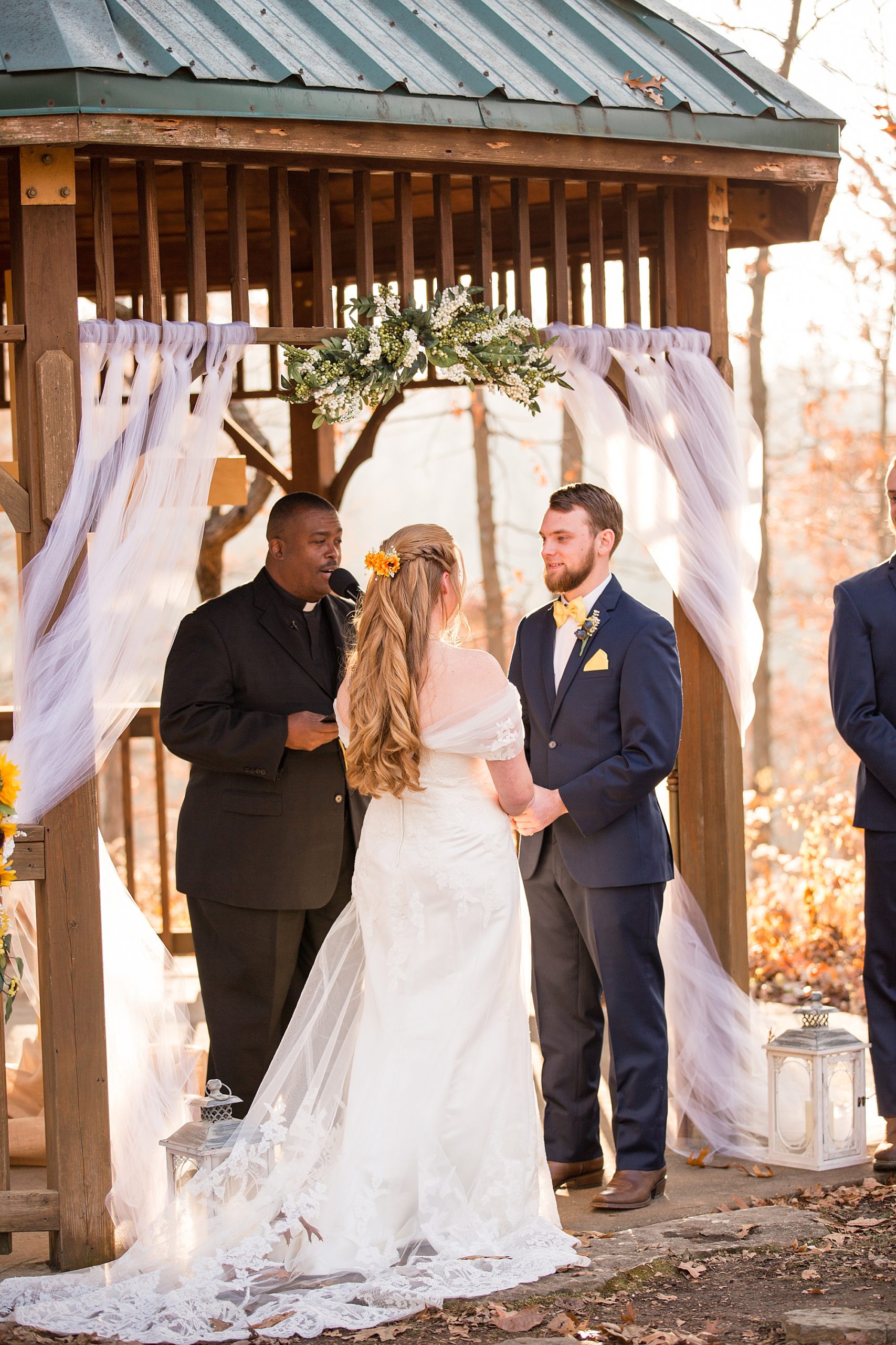 newlyweds exchange vows during wedding ceremony in Wentzville MO