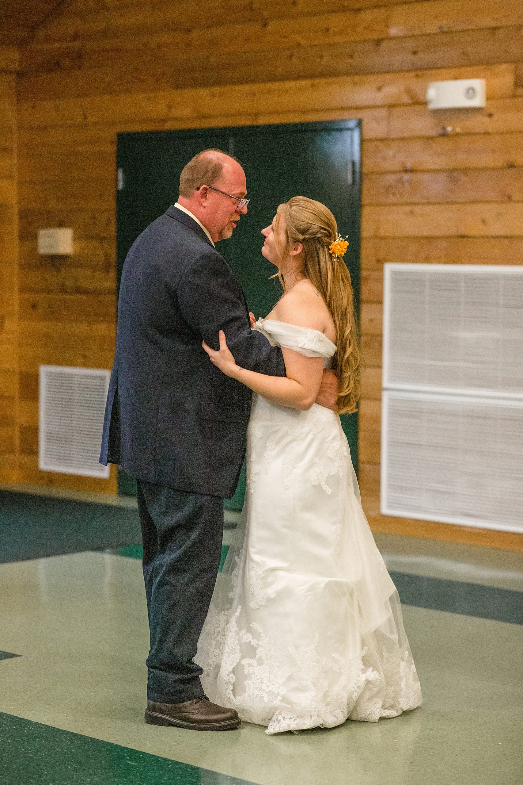 dad dances with bride during MO wedding reception
