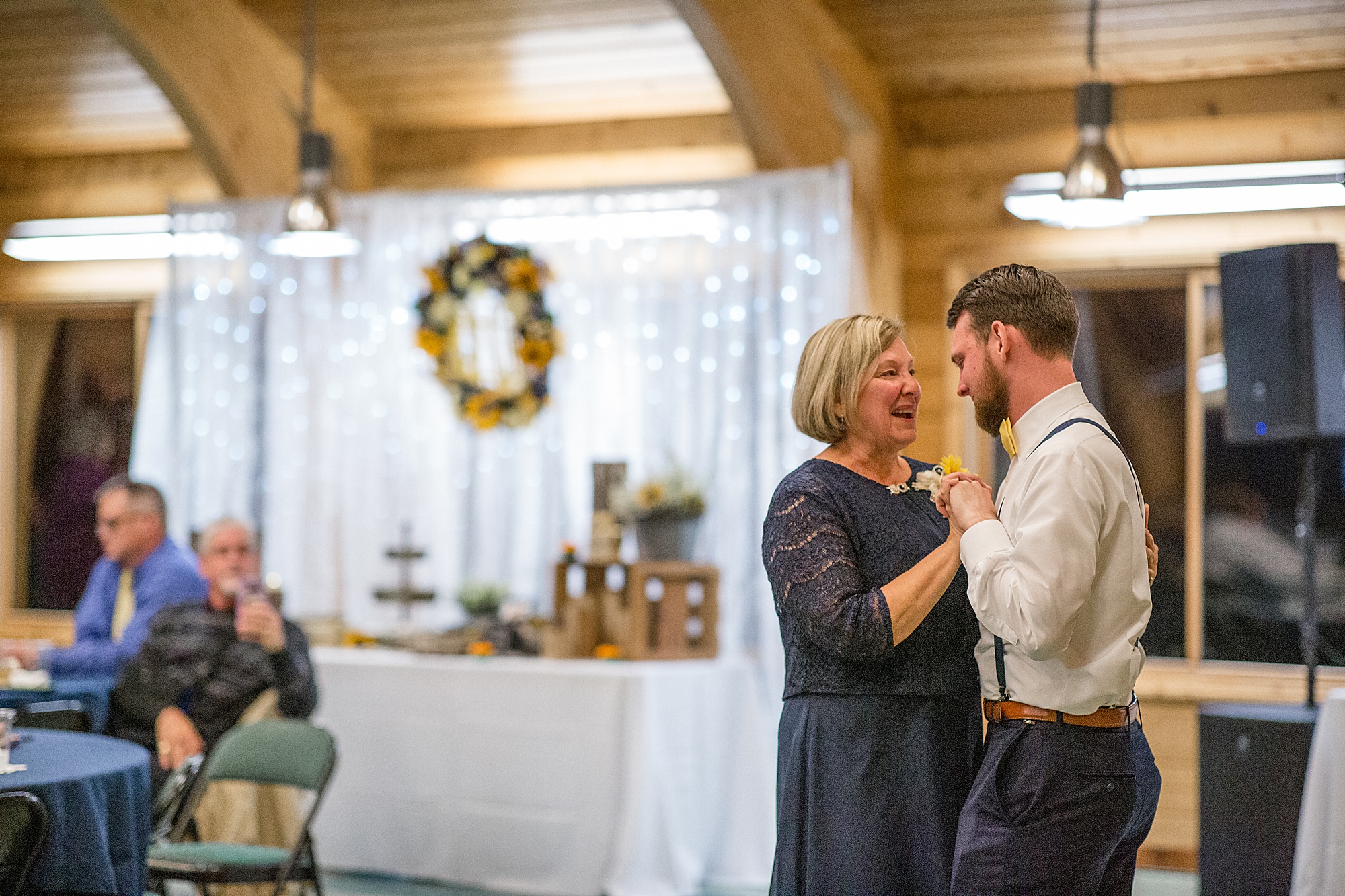 groom and mom dance at MO wedding reception