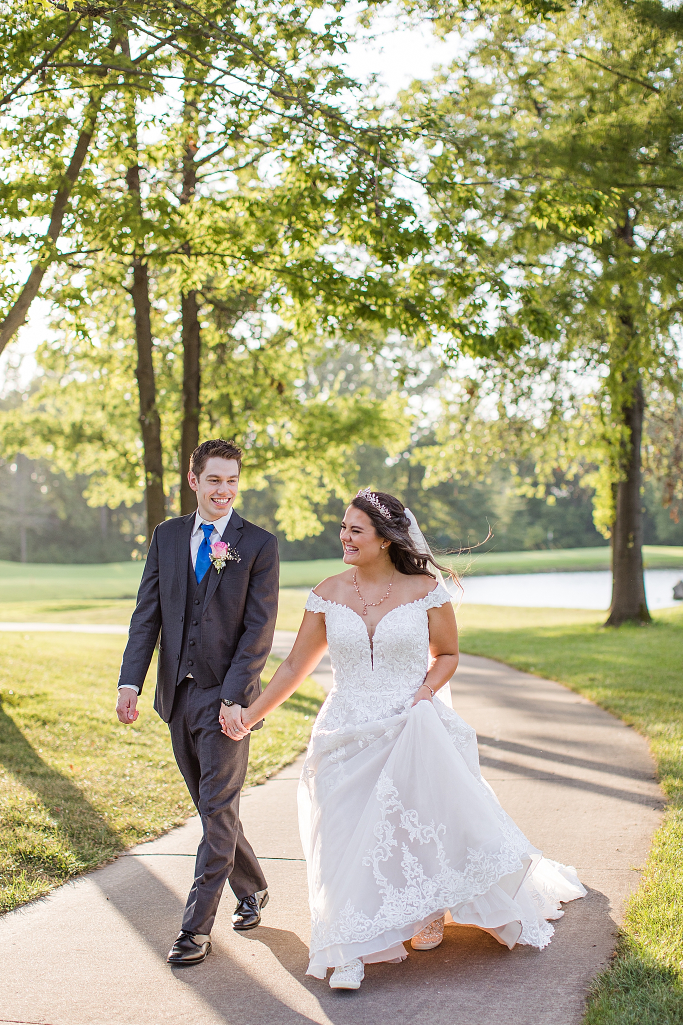 bride and groom walk through Old Hickory Golf Club