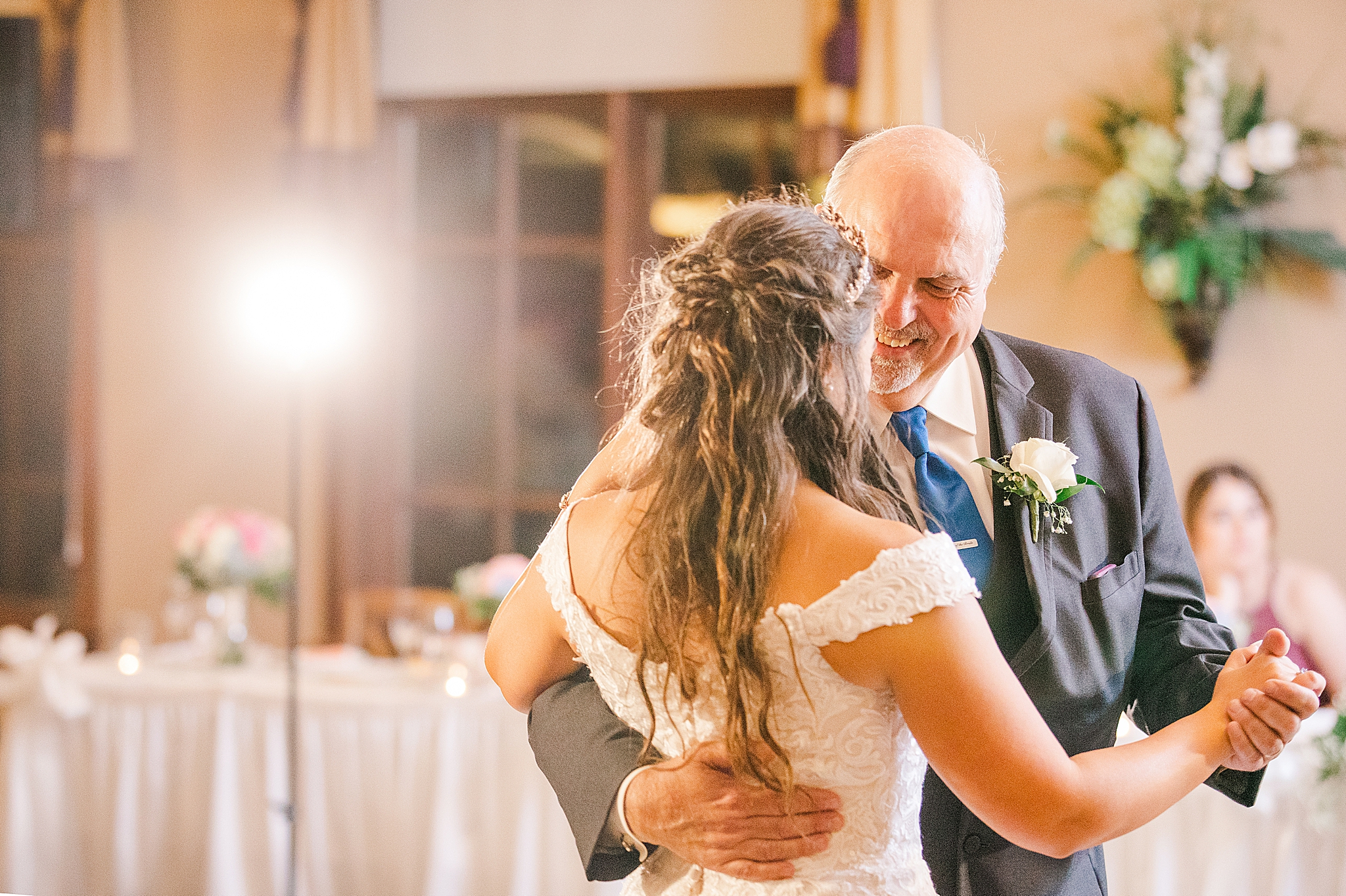 dad dances with bride during MO wedding reception