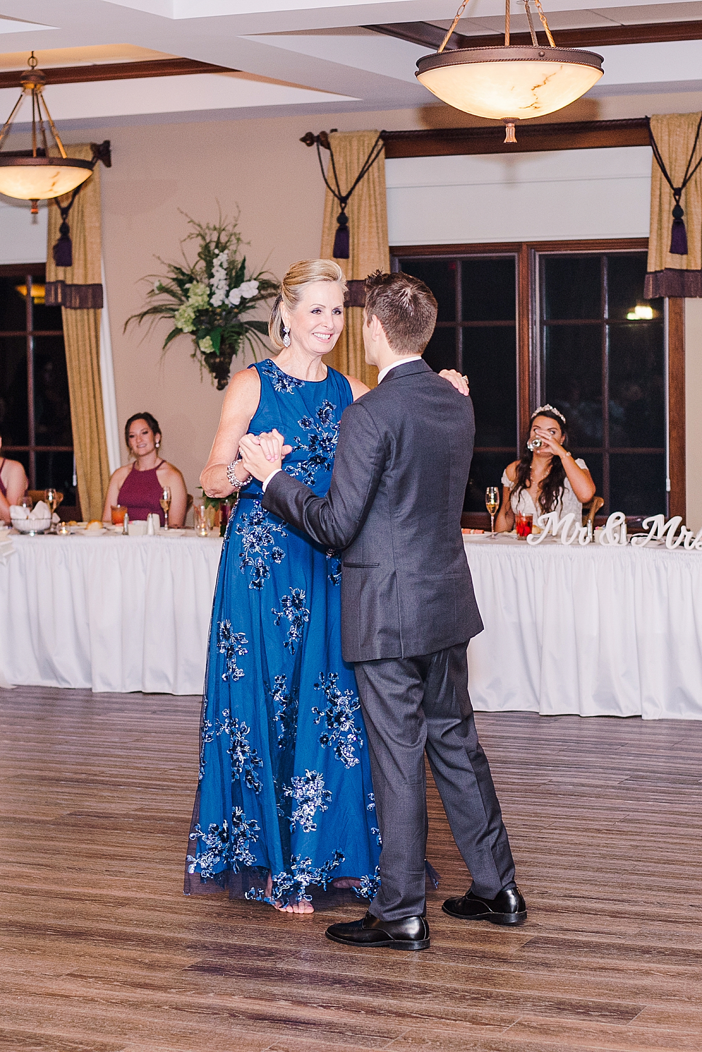 groom dances with mom during St. Peters wedding reception